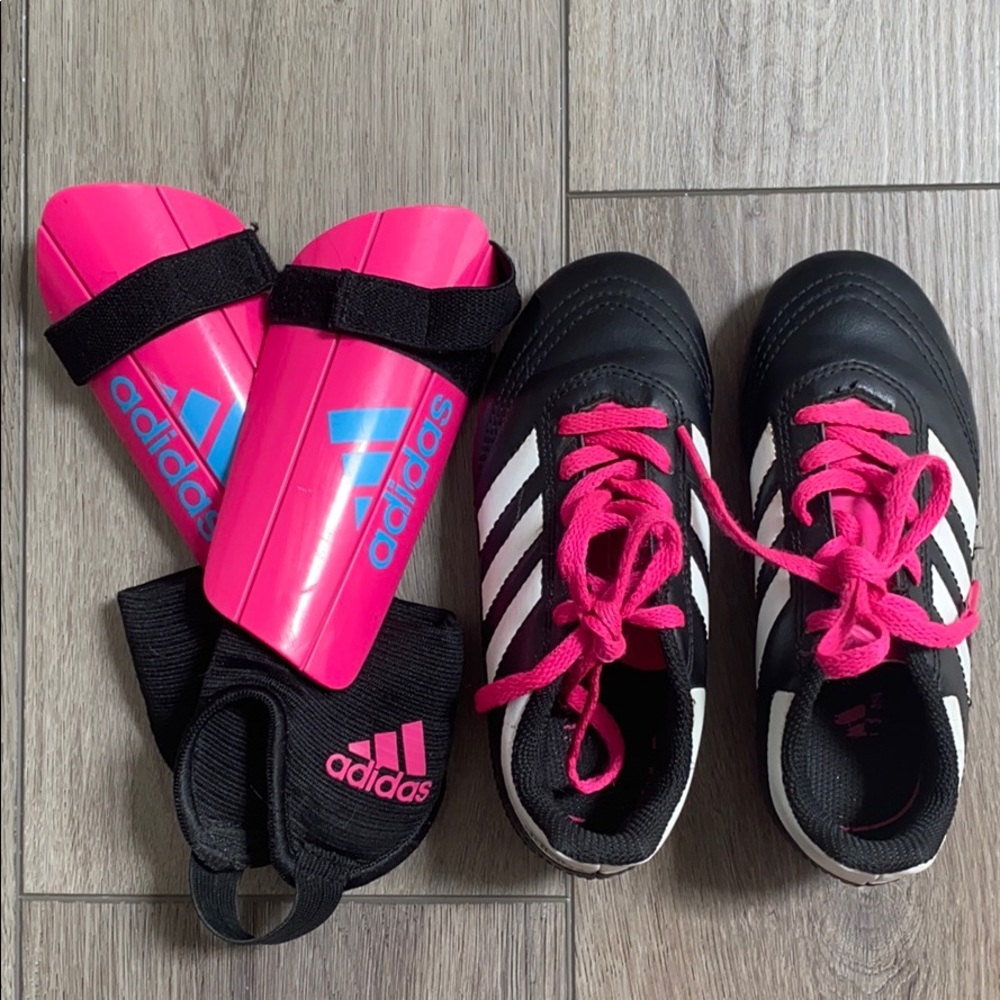 Girls Adidas soccer cleats and shin guards